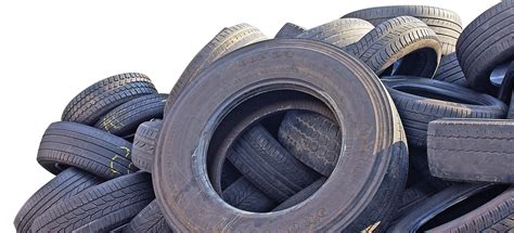 Pile of used truck and passenger vehicle tires