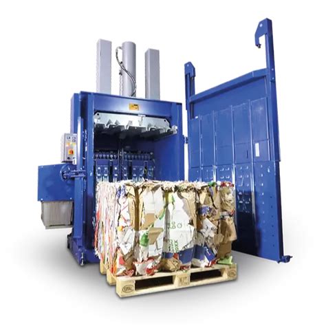 Vertical cardboard baler with a compressed bale of corrugated cardboard